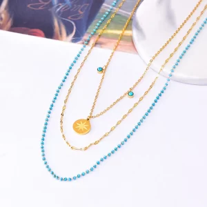 Collar Multicadena en Tonos Azul Turquesa y Dorado